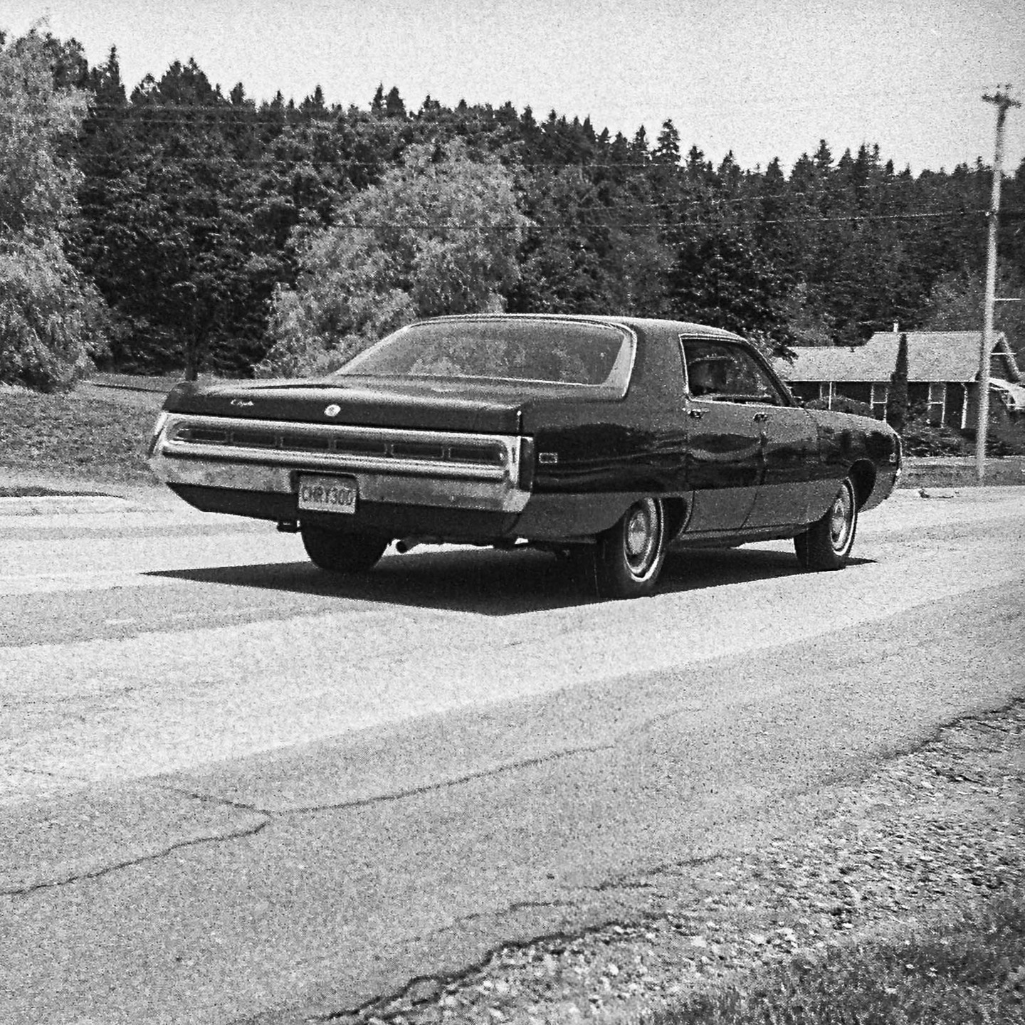 Chrysler 300

Camera: 1945 Universal Mercury II
Film: Kodak Double X
Developer: Caffenol CM